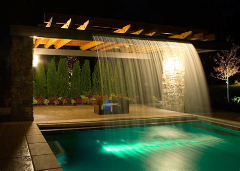 Waterfall in the pool. Prairie inspired design Backyard Pool Designs ...