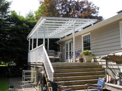 Glass roof for the patio - the benefits of a glass canopy