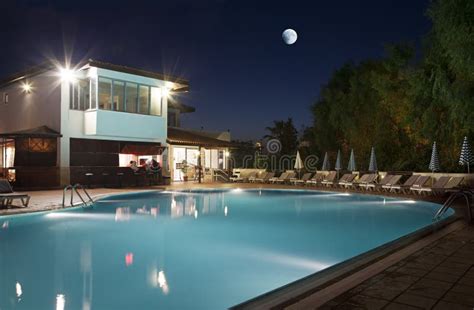 Resort pool at night stock image. Image of night, architecture - 35225733