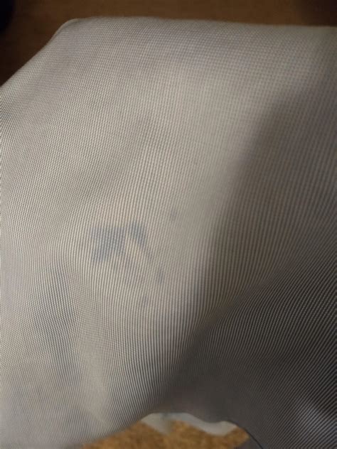 How to remove this dark blue stain from a light blue shirt which appeared after washing ? : r/howto