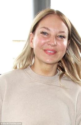 Singer Sia looks really young as she's spotted at LAX without her signature wig