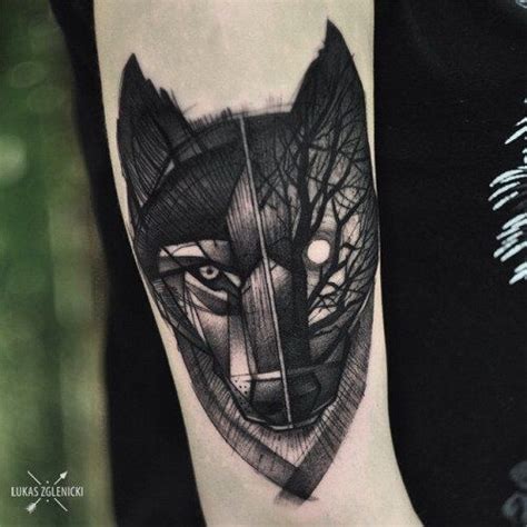 Unique painted black ink wolf face tattoo on forearm stylized with night forest - Tattooimages.biz