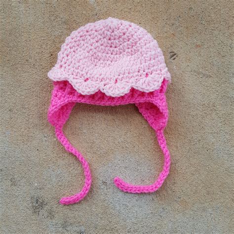 Front view of a pink crochet hat for an infant | www.crochet… | Flickr