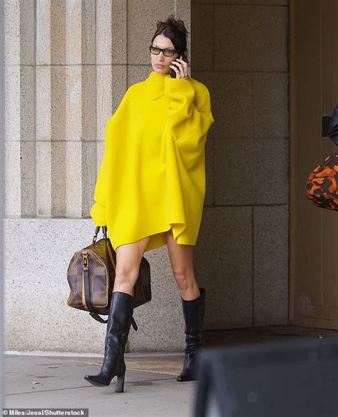 Bella Hadid stands out in a bright yellow coat - Sound Health and ...