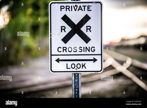 Private railroad crossing sign Stock Photo - Alamy