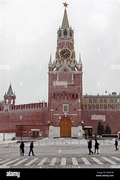 Spassky gate in the kremlin red square during snowfall in winter in ...