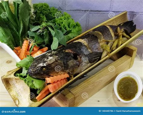 Steamed Fish in Bamboo, Thai Food Stock Photo - Image of closeup, flour ...