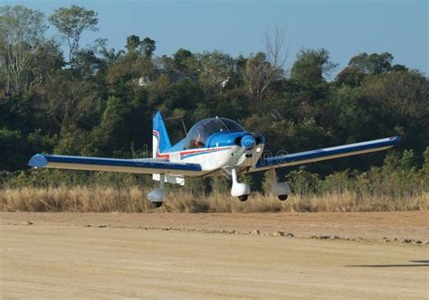 Small airplane landing stock photo. Image of land, airplane - 4012310