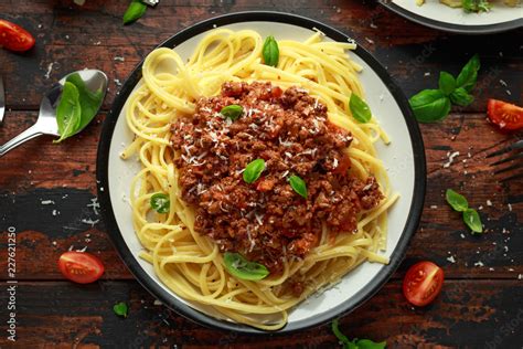 Italian pasta bolognese with beef, basil and parmesan cheese Stock ...