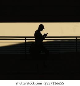 Photo Silhouette Person Using Their Phone AI-generated image 2357116655 ...