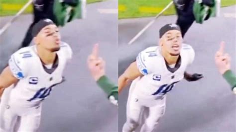 WATCH: Amon-Ra St. Brown blows a kiss to an angry Packers fan who ...