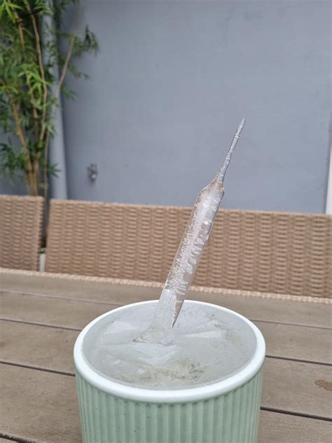 Ice sickle formed into the air - no roof or similar that have dripped ...