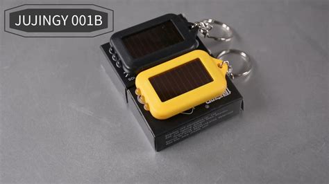 Cheap Wholesale Mini Keychain Flashlight 1uv+2 Led Flashlight Keychain Solar Charging Key ...