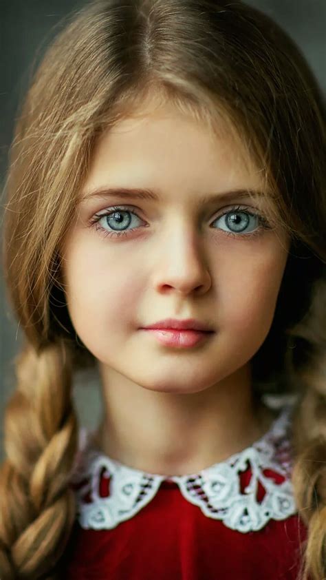 LOVELY BLUE-EYED GIRL. She looks like she is from another century ...