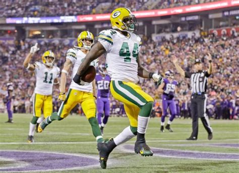 Green Bay Packers running back James Starks (44) runs into the end zone ...