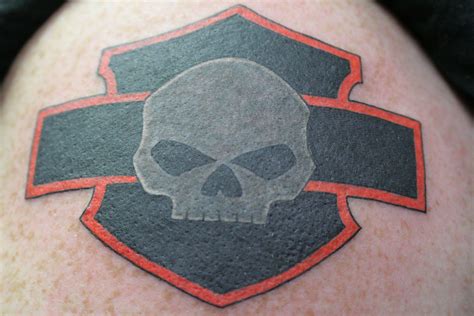 Bar And Shield Tattoo