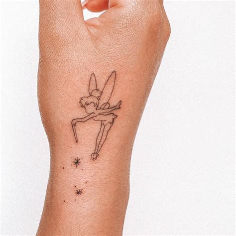 Fine line Tinker Bell tattoo on the hand.