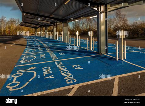 Electric vehicle charging station with solar panel canopy at Monks Cross park and ride site ...