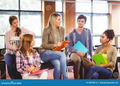 Happy Students Talking with Their Teacher Stock Photo - Image of ...