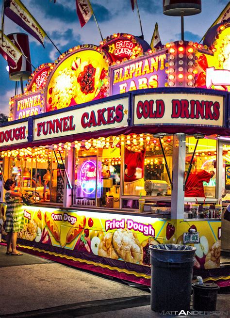 Pregnant Woman. A night time fair / carnival midway food s… | Flickr