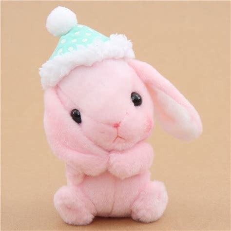 pink bunny rabbit with green cap holding ear Poteusa Loppy plush toy ...