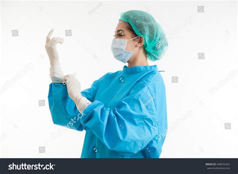 Young Female Surgeon Mask Gown Putting Stock Photo (Edit Now) 448876204