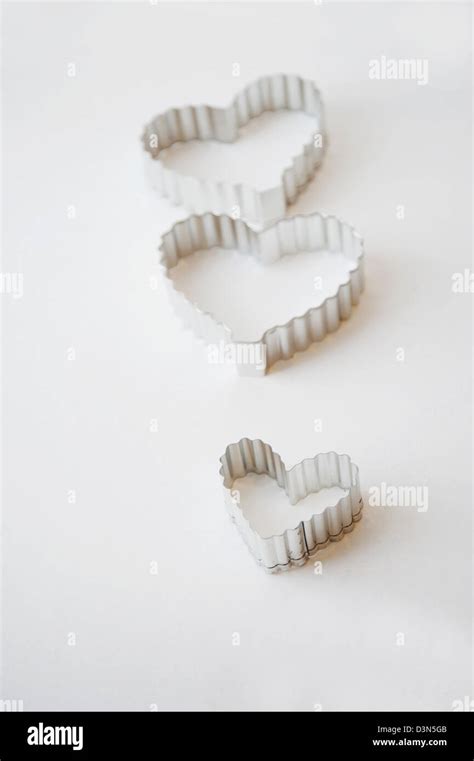 Heart shaped cookie cutters Stock Photo - Alamy