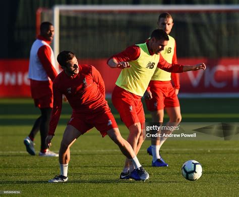 Adam Lallana and James Milner of Liverpool during a training session ...