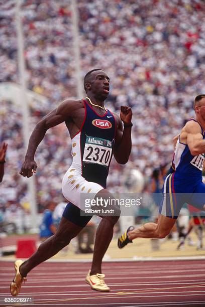 81 Michael Johnson Gold Shoes Photos & High Res Pictures - Getty Images