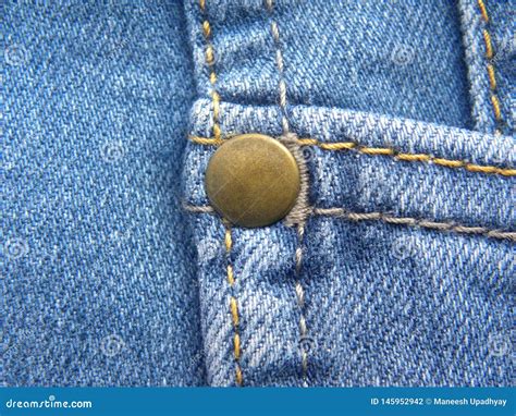 Rivet on blue color jeans stock photo. Image of detail - 145952942