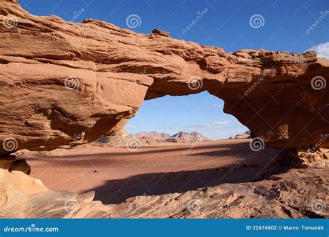 Through a Bridge in the Rock, Wadi Rum Stock Photo - Image of desert ...