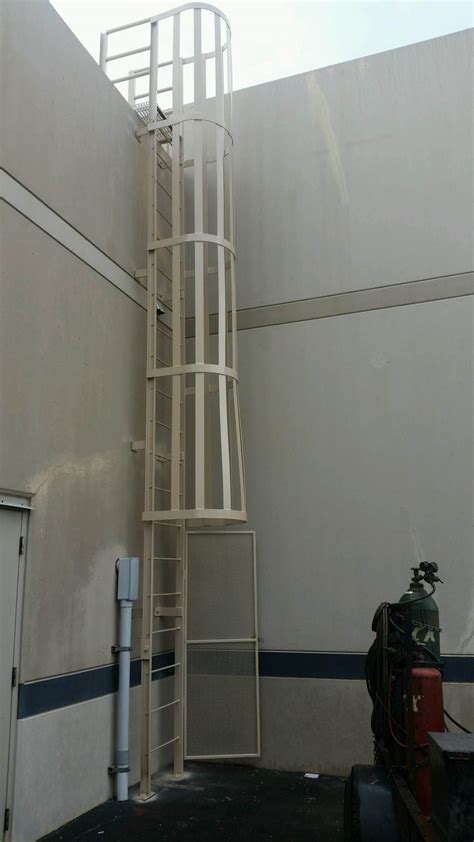 Fire Escape Ladder with Safety Cage - Valley Park Welding