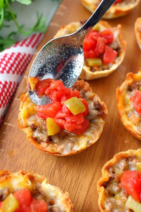 These Easy Baked Mini Tacos will be your new favorite appetizer! Loaded with all your Tex-Mex ...