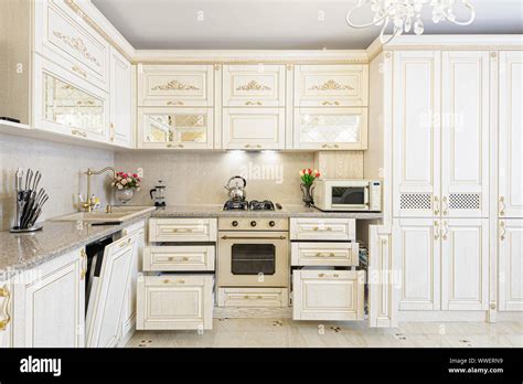 Luxury modern beige and cream colored kitchen interior Stock Photo - Alamy