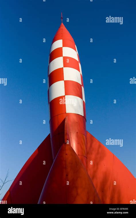 Red and white rocket model. blue sky. Hergé Tintin story. moon landing cartoon. In Chabeuil ...