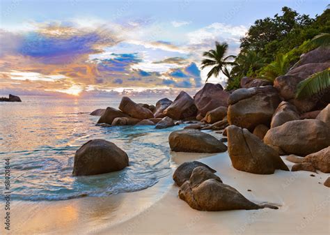 Seychelles tropical beach at sunset Stock Photo | Adobe Stock