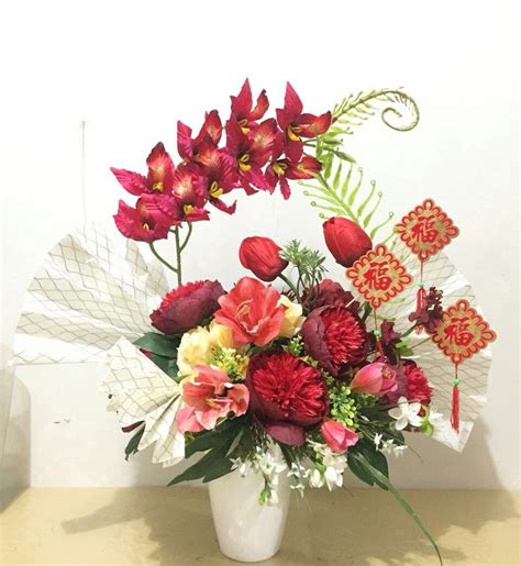 Chinese new year flower arrangement #cny | Chinese new year flower arrangement, New years flower ...