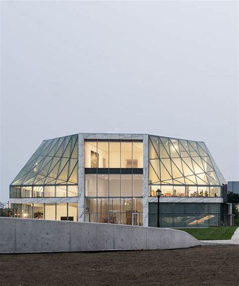 OMA's new art museum in new york seamlessly blends the tranquility of ...