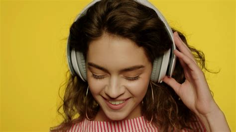 Portrait Of Joyful Woman Enjoying Music In Stock Footage SBV-333551850 - Storyblocks