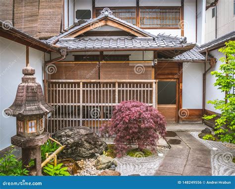 An Entrance To a Japanese Traditional Hotel. Sliding Doors at a Ryokan in Japan. a Yard of a ...