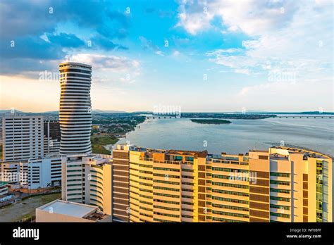 Urban skyline of Guayaquil city and its skyscrapers by the river Guayas ...