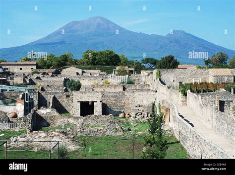 View of the Pompeii ruins in italy with Mount Vesuvius in background ...