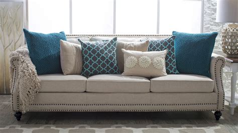 5 Ways to Decorate a Neutral Sofa with Throw Pillows - Hayneedle | Beige sofa living room ...