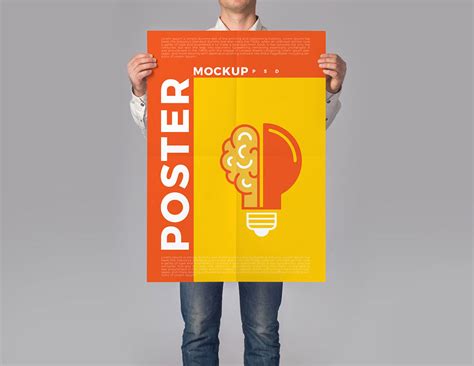 Free Man Holding Poster PSD Mockup | Mockuptree