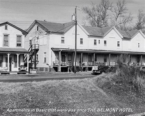 an old black and white photo of some houses