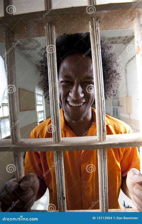 Happy Man in Prison Cell stock photo. Image of behind - 13713904