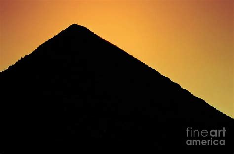 Silhouette of the Great Pyramid of Giza at sunset Photograph by Sami Sarkis - Fine Art America