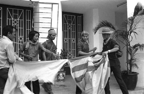 SAIGON 1975 | South Viet flag being torn in front of Nationa… | Flickr