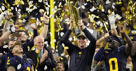 Michigan defeats Washington for college football national title - Los ...