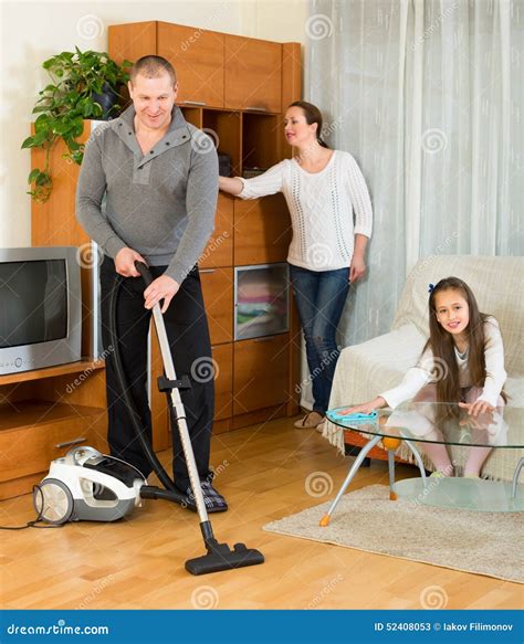 Girl with Parents Cleaning at Home Stock Image - Image of cute ...